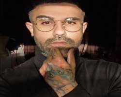 He has several tattoos on his different body parts, which shows that the YouTuber is a tattoo freak.